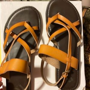 Brown leather. Report. Sandals